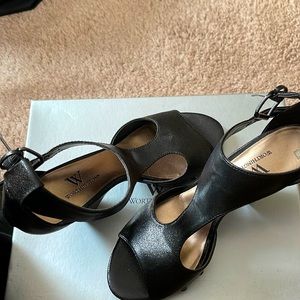 Worthington black leather look with stud accents.